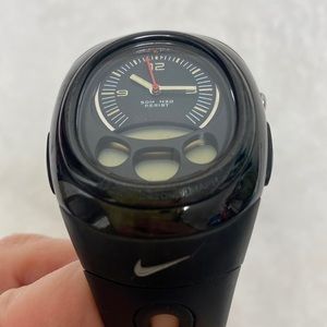 Nike Sports watch.  Black, silicone band.  Waterproof.  Nice condition.